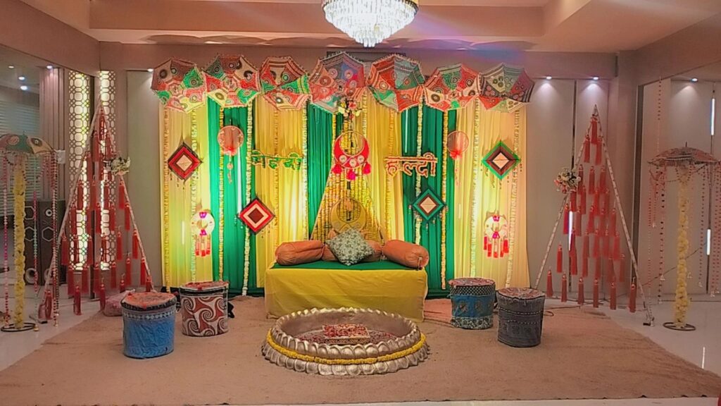 Mehndi and haldi stage decor at Hotel Golf View Sakura & Suites, Gurgaon